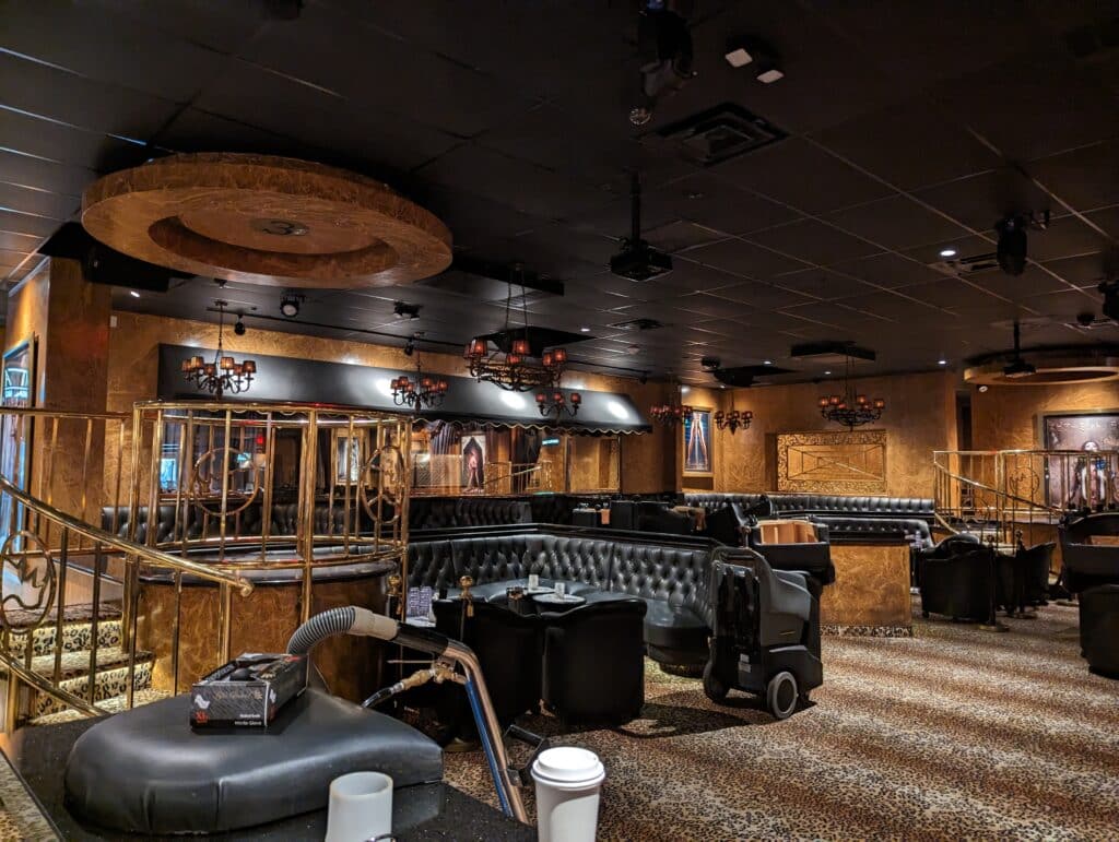 The VIP lounge at Spearmint Rhino Las Vegas featuring bottle service and upscale seating for guests arriving via free transportation.